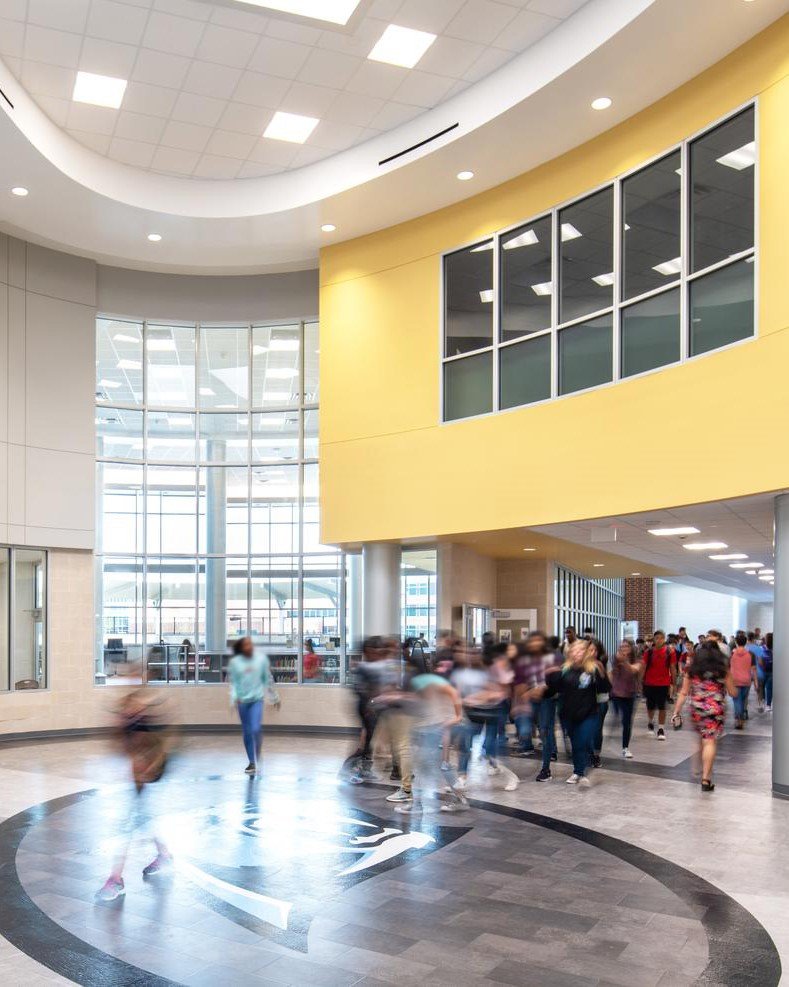 Katy ISD - Stockdick Junior High SchoolStockdick Junior High School is a 189,900 SF, three-story building on a 32 acre site.  Construction elements include slab on grade, steel frame, modified bitumen and standing seam roofing, porcelain tile, terrazzo and LVT flooring.  The exterior is clad with face brick, natural stone and metal panels.  The facility includes classrooms, wood floor gymnasium, science laboratories, food service, administration and fine arts areas.  On site improvements include concrete paving, covered walkways, site utilities, athletic fields, running track and tennis courts.Back to Portfolio